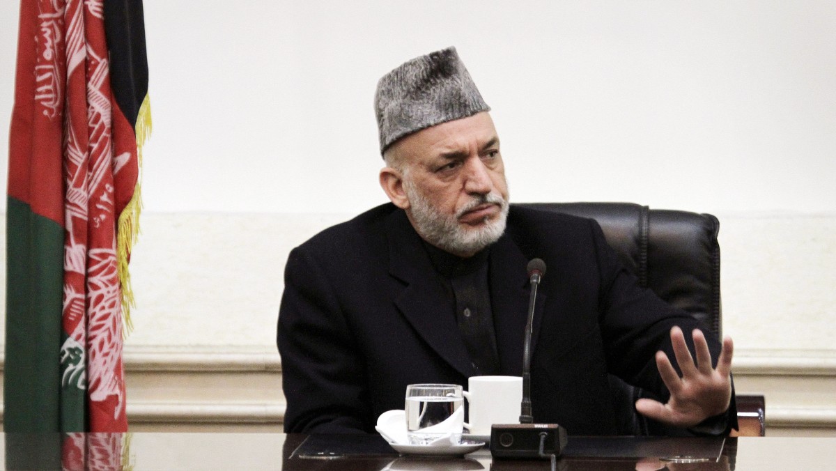 Afghan President Hamid Karzai listens to speeches of a family member,unseen, of Afghan civilians who were killed Sunday by a US soldier in Panjwai in Kandahar province at the presidential palace in Kabul, Afghanistan, Friday, March 16, 2012. Afghan President Hamid Karzai lashed out at the United States on Friday, saying he is at the "the end of the rope" because of the lack of U.S. cooperation into a probe of a killing spree allegedly carried out by an American soldier. (AP Photo/Ahmad Jamshid)