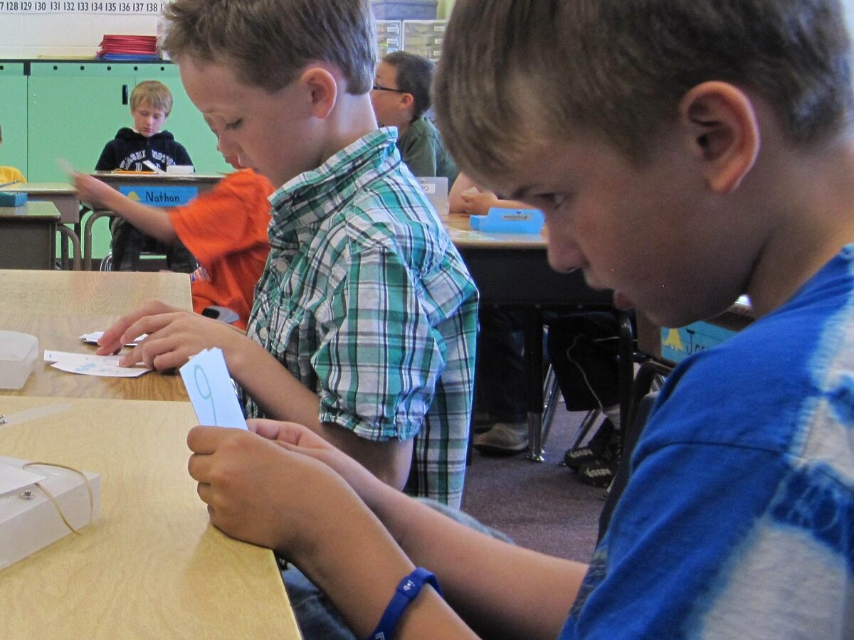 In this photo taken May 9, 2012, students work in a classroom. (AP Photo/Jessie L. Bonner).