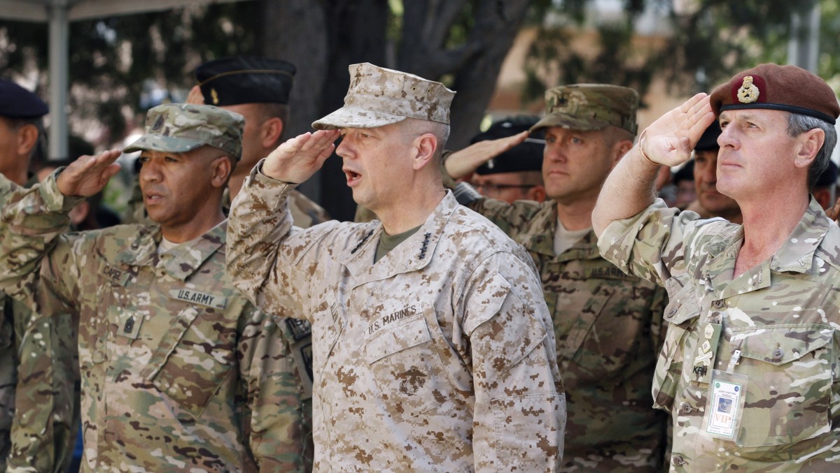 U.S. Marine Gen. John Allen, center, the top commander of U.S. and ...