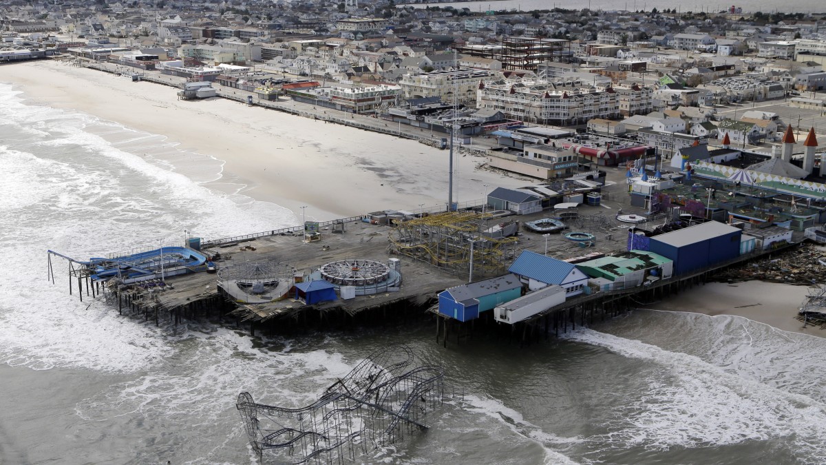 This Oct. 31, 2012 file aerial photo shows the damage to an amusement park left in the wake of Superstorm Sandy, in Seaside Heights, N.J. (AP Photo/Mike Groll, File)