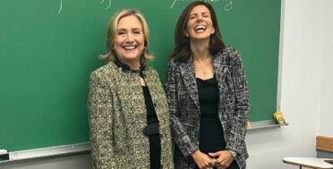 Keren Yarhi-Milo poses with Hillary Clinton